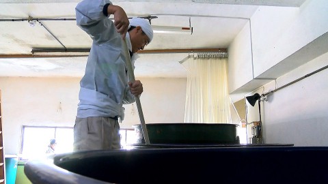 the brew master at Funaki Brewery, Mr.Nojiri is working on brewing