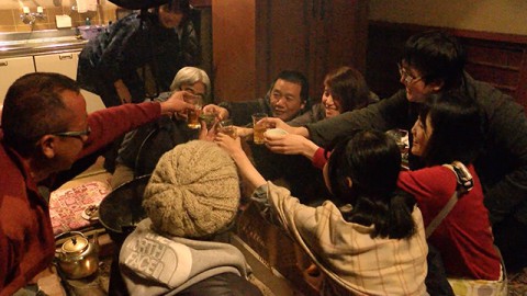 drinking and eating around Irori fireplace