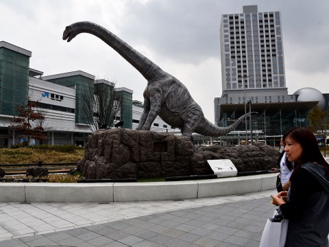 replicas of real dinosaurs in front of Fukui Station. 
