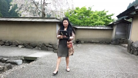 Mr. Ugyen Dorji's sister is walking in the starting point of the restored town