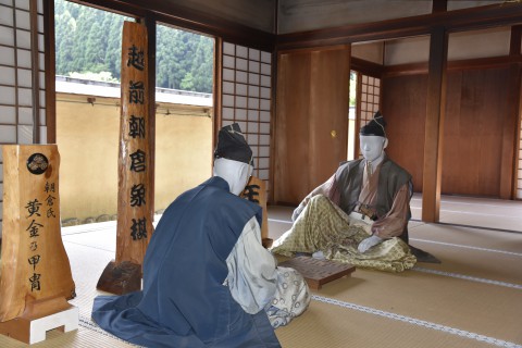two men from the Warring States Period are playiong a Japanese board game called Shogi
