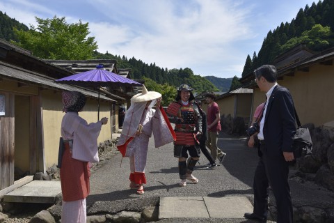 julia and mr. takama finished wearing kimono and an armor