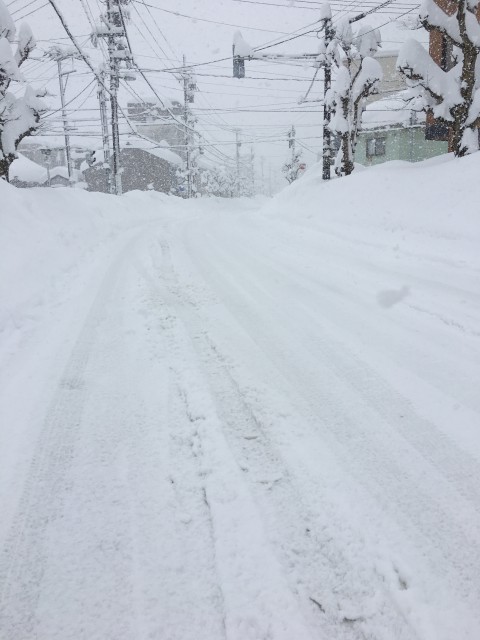 a road covered with so much snow in Fukui City on February 7th, 2018