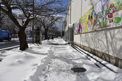a sidewalk in front of NHK Fukui
