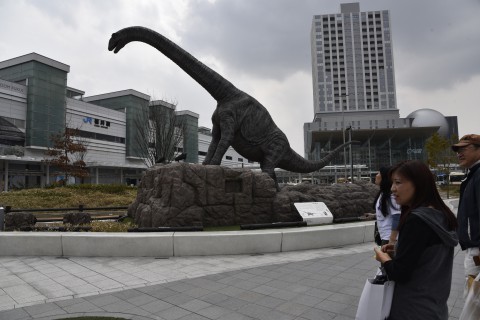 moving dinosaurs in front of Fukui Station