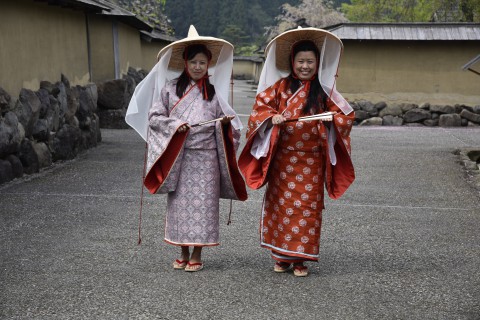 Mr. Ugyen Dorji's wife and sister are wearing kimono from the Warring State period